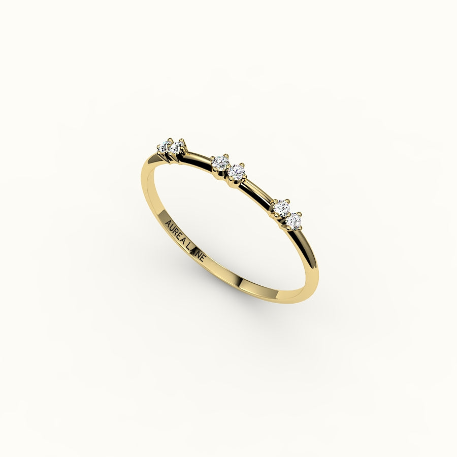 Banda de diamantes redondos salteados