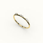 Banda de diamantes redondos salteados