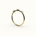 Banda de diamantes redondos salteados